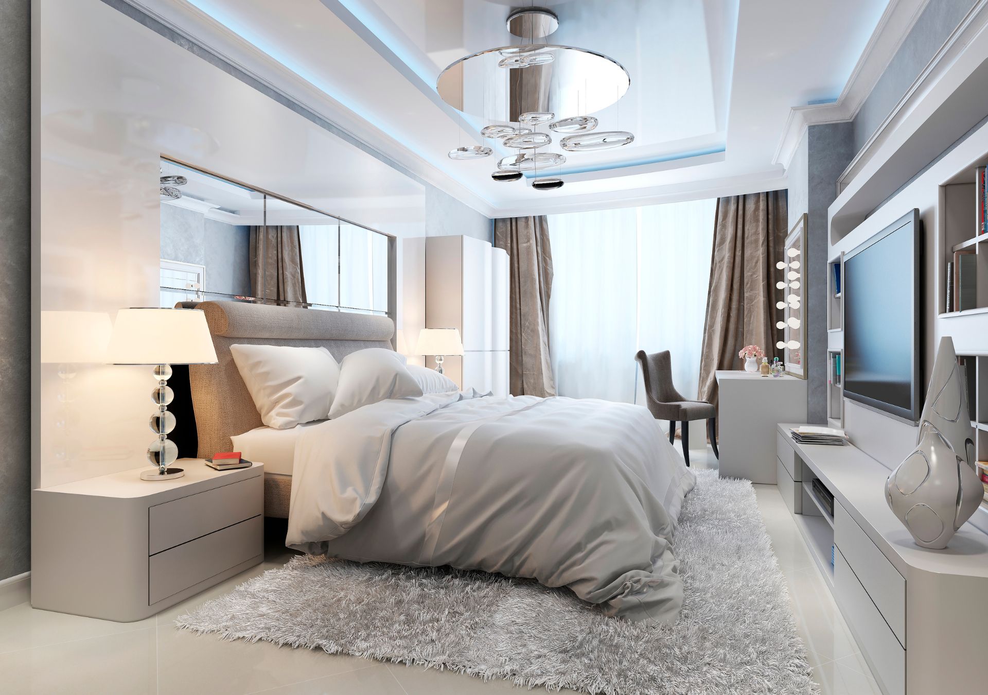 Elegant bedroom with crystal chandelier and mirrored walls