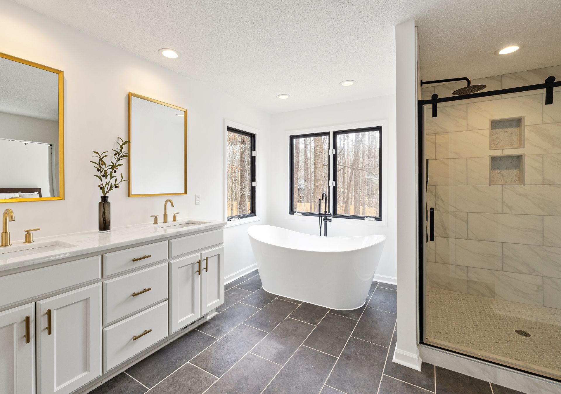 Bathroom with freestanding tub and double vanity